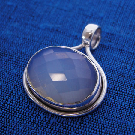Wholesale sterling silver and faceted stone pendant.