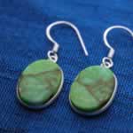 green turquoise stone earrings set in silver
